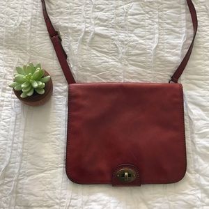 Leather Fossil red crossbody purse.
